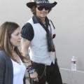 Johnny Depp signing autographs outside "Jimmy Kimmel Live!" in Los Angeles, California on May 8, 2012.