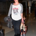 "Resident Evil" actress Milla Jovovich arrived at JFK Airport in New York on May 6, 2012. The actress had her daughter Ever Anderson riding along on her luggage.