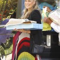 Molly Sims receiving lots of gifts at her baby shower at a Hollywood Hills private residence in Hollywood, California on May 5, 2012. Molly's husband Scott Stuber came to pick her up after the party