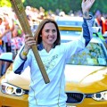 ormer "Spice Girl" Melanie Chisholm, Mel C, starts her run with the Olympic Torch in Liverpool, England on June 1, 2012..