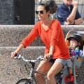 Jennifer Connelly and husband Paul Bettany out for a bike ride with their children Stellan and Agnes in New York City, New York on August 29, 2012.