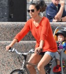 Jennifer Connelly and husband Paul Bettany out for a bike ride with their children Stellan and Agnes in New York City, New York on August 29, 2012.