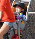 Jennifer Connelly and husband Paul Bettany out for a bike ride with their children Stellan and Agnes in New York City, New York on August 29, 2012.