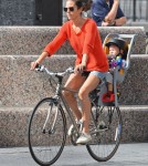 Jennifer Connelly and husband Paul Bettany out for a bike ride with their children Stellan and Agnes in New York City, New York on August 29, 2012.