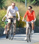 Jennifer Connelly and husband Paul Bettany out for a bike ride with their children Stellan and Agnes in New York City, New York on August 29, 2012.