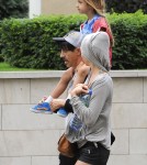 Red Hot Chili Peppers singer Anthony Kiedis spends his free time playing with his son Everly Bear on playground in a park in Prague, Czech Republic on August 26, 2012. Anthony, his girlfriend and Everly chased each other around on the grass.