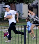 Red Hot Chili Peppers singer Anthony Kiedis spends his free time playing with his son Everly Bear on playground in a park in Prague, Czech Republic on August 26, 2012. Anthony, his girlfriend and Everly chased each other around on the grass.