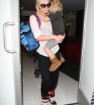Singer Ashlee Simpson arrived at the LAX Airport in Los Angeles, California on August 29, 2012 with her son Bronx Wentz in her arms to catch a flight out of town.