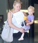 Christina Applegate and her daughter Sadie stopping by a Health And Wellness center while out running errands in Sherman Oaks, California on August 22, 2012.