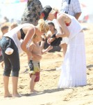 Singer Gwen Stefani and her sons Kingston and Zuma enjoying a day on the beach with friends and family members in Newport Beach, California on August 19, 2012.