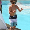 Jennifer Lopez and her boyfriend Casper Smart take her kids Emme and Max to the pool at their hotel in Miami, Florida on August 30, 2012.