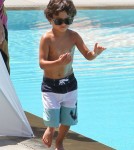 Jennifer Lopez and her boyfriend Casper Smart take her kids Emme and Max to the pool at their hotel in Miami, Florida on August 30, 2012.