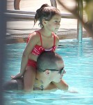 Jennifer Lopez and her boyfriend Casper Smart take her kids Emme and Max to the pool at their hotel in Miami, Florida on August 30, 2012.