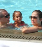 Jennifer Lopez and her boyfriend Casper Smart take her kids Emme and Max to the pool at their hotel in Miami, Florida on August 30, 2012.
