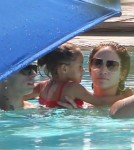 Jennifer Lopez and her boyfriend Casper Smart take her kids Emme and Max to the pool at their hotel in Miami, Florida on August 30, 2012.
