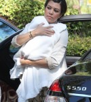 Kim and Kourtney Kardashian arrived at a church in Thousand Oaks, California on August 26, 2012. Kourtney had her children daughter Penelope and son Mason Disick with them for the service. Kim made sure Mason was taken care of while mom Kourtney kept his new baby sister covered on the way into the church.