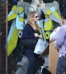 Elizabeth Berkley, her husband Greg Lauren and their new born son Sky Lauren out shopping at Bel Bambini in Beverly Hills, California on September 17, 2012.