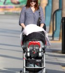 Alyson Hannigan was spotted taking her baby girl, Keeva Denisof, for a walk in Santa Monica, California on September 28, 2012.
