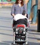 Alyson Hannigan was spotted taking her baby girl, Keeva Denisof, for a walk in Santa Monica, California on September 28, 2012.