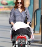 Alyson Hannigan was spotted taking her baby girl, Keeva Denisof, for a walk in Santa Monica, California on September 28, 2012.