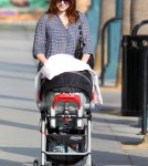 Alyson Hannigan was spotted taking her baby girl, Keeva Denisof, for a walk in Santa Monica, California on September 28, 2012.