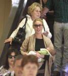 Katherine Heigl, her mom Nancy, husband Josh and new baby Adalaide arriving on a flight at LAX airport in Los Angeles, California on September 6, 2012. The family was met at the airport by her adopted sister Meg Heigl
