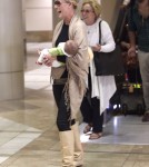 Katherine Heigl, her mom Nancy, husband Josh and new baby Adalaide arriving on a flight at LAX airport in Los Angeles, California on September 6, 2012. The family was met at the airport by her adopted sister Meg Heigl