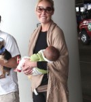 Katherine Heigl, her mom Nancy, husband Josh and new baby Adalaide arriving on a flight at LAX airport in Los Angeles, California on September 6, 2012. The family was met at the airport by her adopted sister Meg Heigl