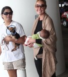 Katherine Heigl, her mom Nancy, husband Josh and new baby Adalaide arriving on a flight at LAX airport in Los Angeles, California on September 6, 2012. The family was met at the airport by her adopted sister Meg Heigl