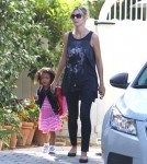 Heidi Klum picks up her daughter Lou from school on September 19, 2012 in Brentwood, California.