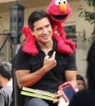Mario Lopez brings his daughter Gia to meet Elmo from Sesame Street on the show EXTRA in Los Angeles, California on September 20, 2012.