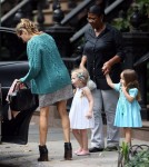 Sarah Jessica Parker helps her daughters Marion and Tabitha into a car in New York City, NY on September 16th, 2012.