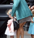Sarah Jessica Parker helps her daughters Marion and Tabitha into a car in New York City, NY on September 16th, 2012.