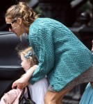 Sarah Jessica Parker helps her daughters Marion and Tabitha into a car in New York City, NY on September 16th, 2012.