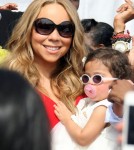 Nick Cannon, Mariah Carey and their twins Monroe and Moroccan attended "Family Day" at the Santa Monica Pier, California on October 6, 2012. The couple took a ride on the roller coaster together and spent time with the twins.