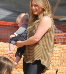 Actress Hilary Duff and husband Mike Comrie take their son Luca to the Mr. Bones Pumpkin Patch in West Hollywood, California on October 13, 2012.