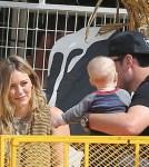 Actress Hilary Duff and husband Mike Comrie take their son Luca to the Mr. Bones Pumpkin Patch in West Hollywood, California on October 13, 2012.