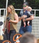 Actress Hilary Duff and husband Mike Comrie take their son Luca to the Mr. Bones Pumpkin Patch in West Hollywood, California on October 13, 2012.