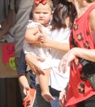 Roselyn Sanchez and husband Eric Winter take their daughter Sebella to the Mr. Bones Pumpkin Patch in West Hollywood, California on October 14, 2012.