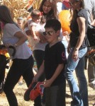 Roselyn Sanchez and husband Eric Winter take their daughter Sebella to the Mr. Bones Pumpkin Patch in West Hollywood, California on October 14, 2012.