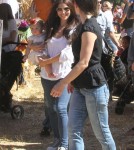 Roselyn Sanchez and husband Eric Winter take their daughter Sebella to the Mr. Bones Pumpkin Patch in West Hollywood, California on October 14, 2012.