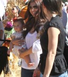 Roselyn Sanchez and husband Eric Winter take their daughter Sebella to the Mr. Bones Pumpkin Patch in West Hollywood, California on October 14, 2012.