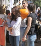 Roselyn Sanchez and husband Eric Winter take their daughter Sebella to the Mr. Bones Pumpkin Patch in West Hollywood, California on October 14, 2012.