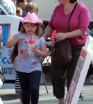 Carnie Wilson and her children, Lola and Luci Bonfiglio, cooled off with snow-cones at the West Hollywood Market in Los Angeles, California on October 7, 2012.