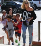 Heidi Klum and her kids all cheered for their older brother Henry as he played in his flag football game in Los Angeles, California on September 29th, 2012.