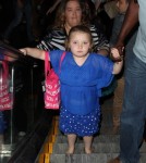 Here Comes Honey Boo Boo' star Alana Thompson and her mom June Shannon take a walk through the Hollywood & Highland mall after appearing on "Jimmy Kimmel Live" on October 15, 2012 in Hollywood, California.