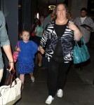 Here Comes Honey Boo Boo' star Alana Thompson and her mom June Shannon take a walk through the Hollywood & Highland mall after appearing on "Jimmy Kimmel Live" on October 15, 2012 in Hollywood, California.