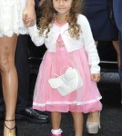 Jennifer Lopez arrives at the Chanel Fashion Show with her daughter Emme and her boyfriend Casper Smart on October 2, 2012 in Paris, France