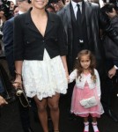 Jennifer Lopez arrives at the Chanel Fashion Show with her daughter Emme and her boyfriend Casper Smart on October 2, 2012 in Paris, France