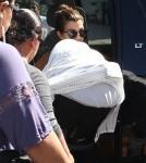 Kourtney Kardashian Heads To The Photo Studio